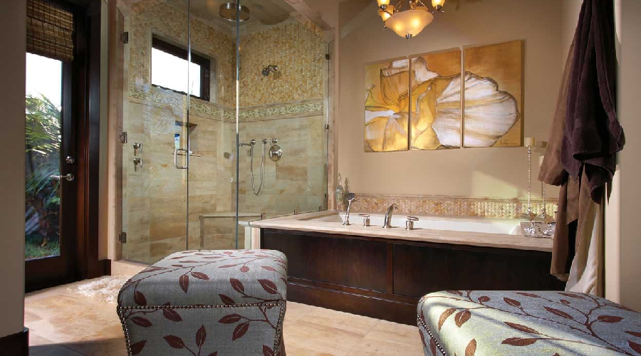 Traditional primary suite with glass walk-in shower, dark wood jetted tub surround, and mosaic tile, Laguna Beach