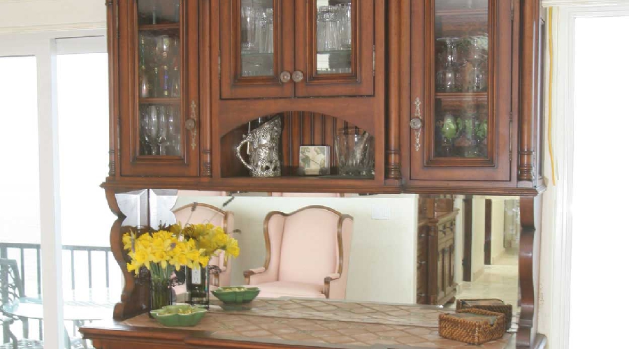 Custom built-in bedroom cabinetry including integrated bed frame and storage, Orange County