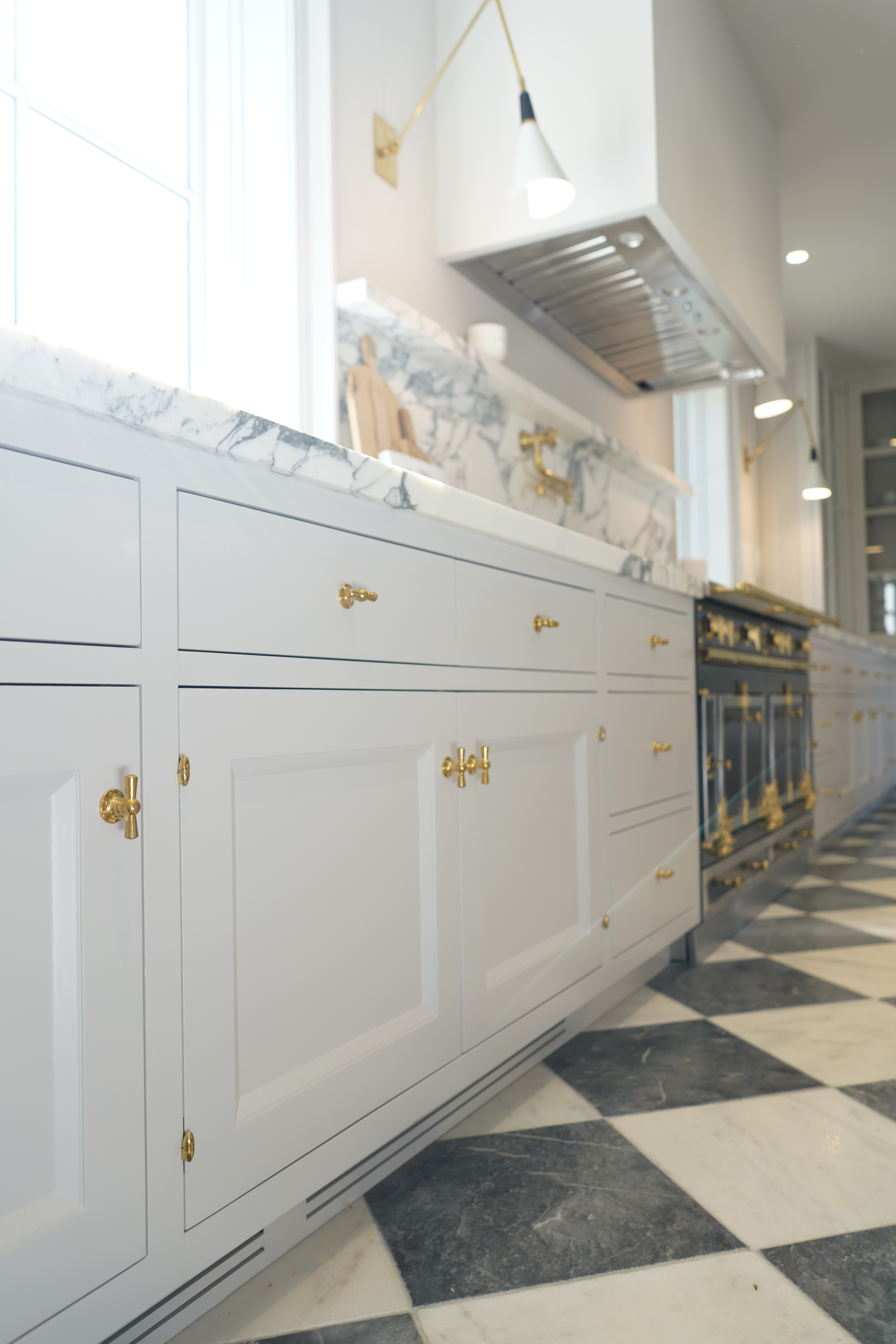 Custom white kitchen cabinet installation Bel Air angle view